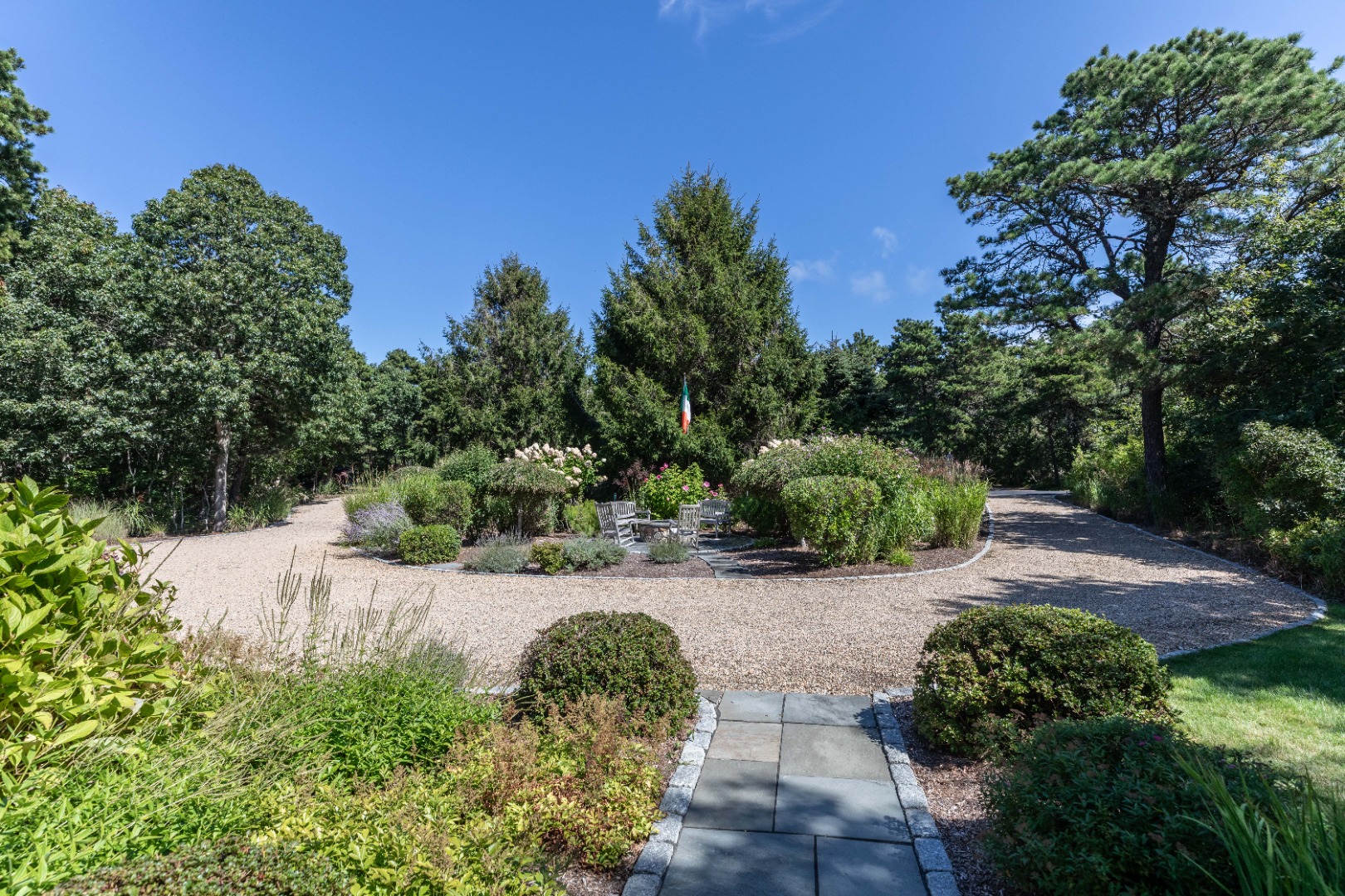 8 Old Dunham's Corner Way Edgartown, MA 02539 - Photo 8 of 37 View of front gardens and firepit