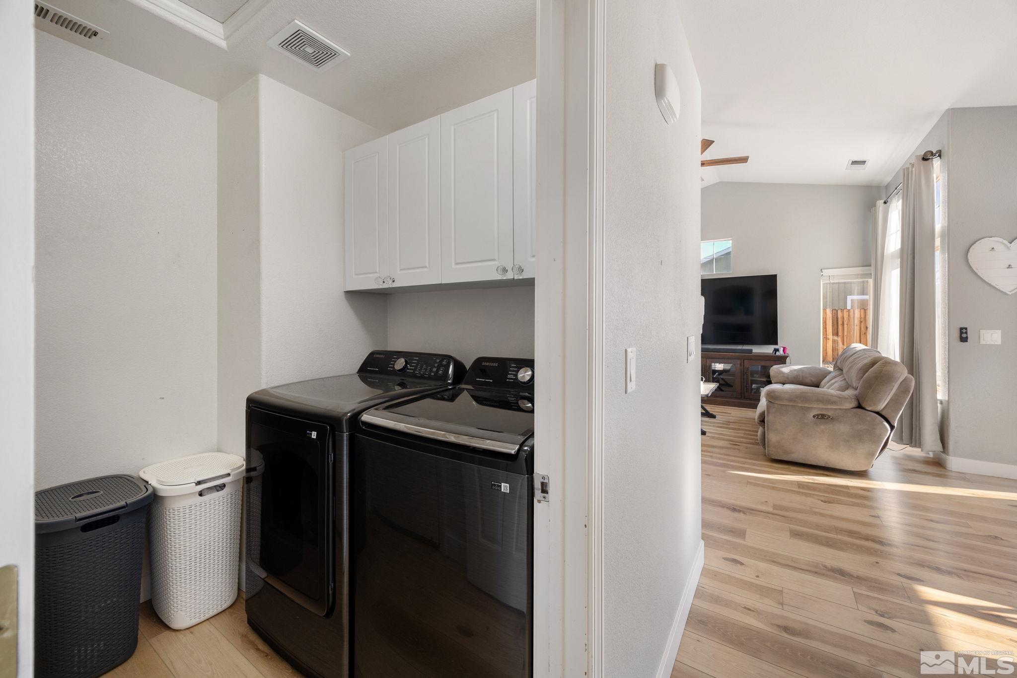 224 Bartmess Boulevard Sparks, NV 89436 - Photo 13 of 20 a kitchen with a stove and a refrigerator