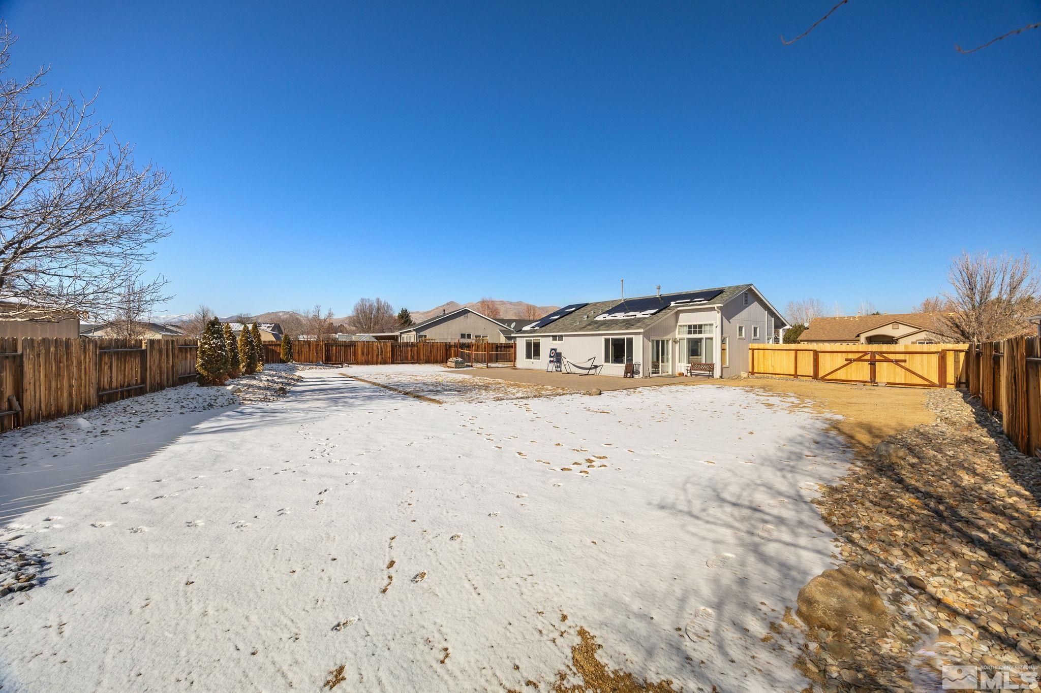 224 Bartmess Boulevard Sparks, NV 89436 - Photo 17 of 20 a front view of a house with a yard