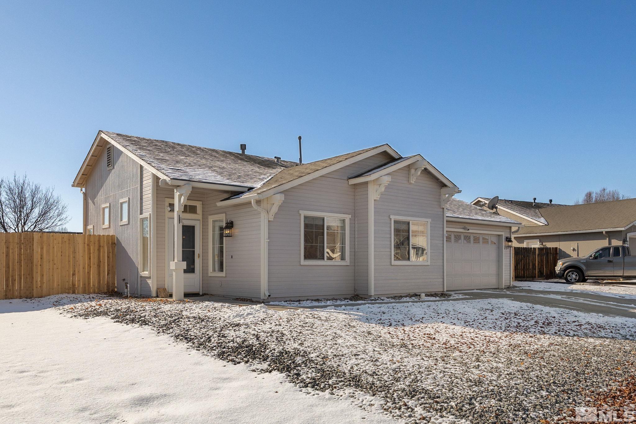 224 Bartmess Boulevard Sparks, NV 89436 - Photo 18 of 20 a view of a house with a yard