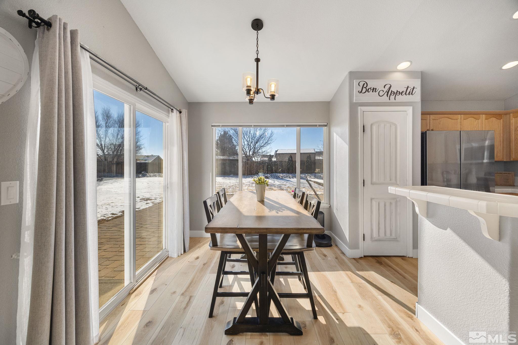 224 Bartmess Boulevard Sparks, NV 89436 - Photo 4 of 20 a dining room with a table and chairs