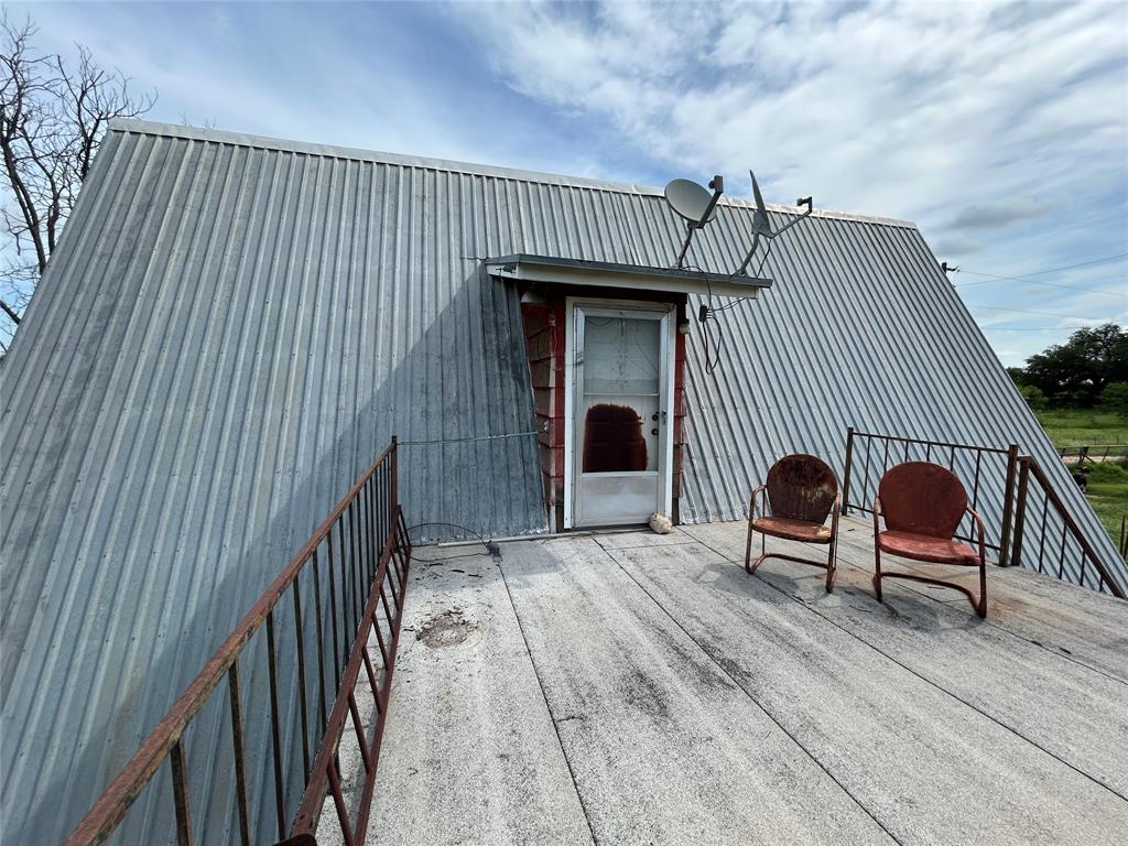 410 County Road 433 Mullin, TX 76864 - Photo 17 of 22 a view of a house with wooden fence