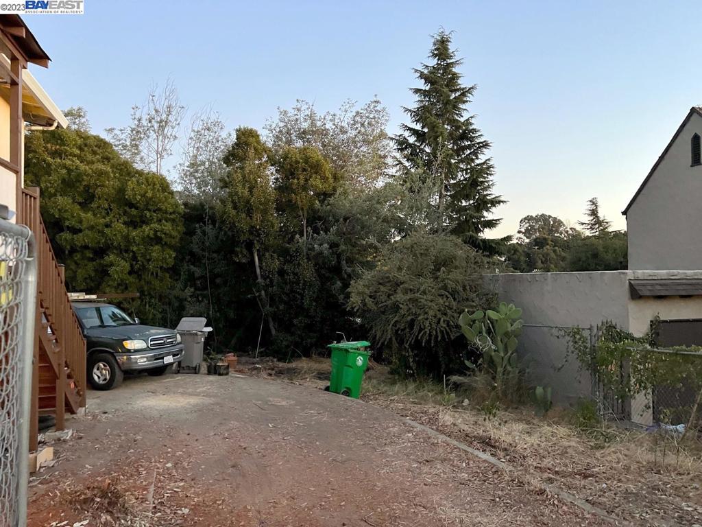 D Street Hayward, CA 94541 - Photo 4 of 9 a view of car parked on road with trees