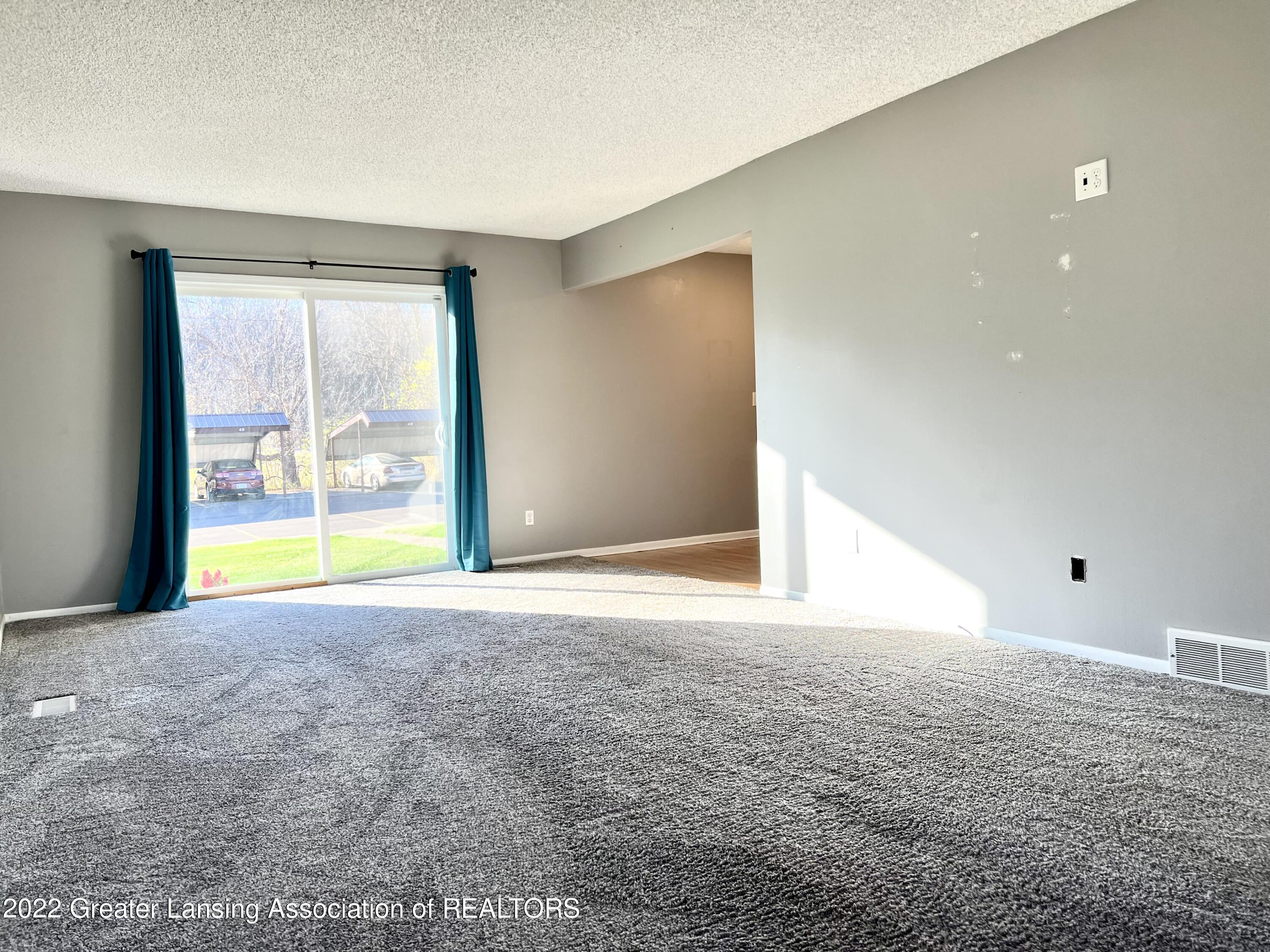 4707 Gull Road, Unit 46 Lansing, MI 48917 - Photo 12 of 27 Living Room 4