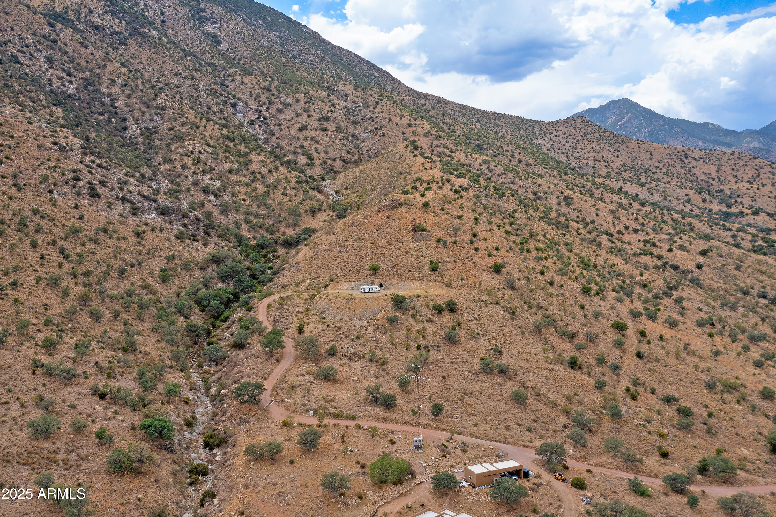 1-mm South Stone Ridge Road, Unit A Hereford, AZ 85615 - Photo 3 of 12 a view of a dry yard covered with snow