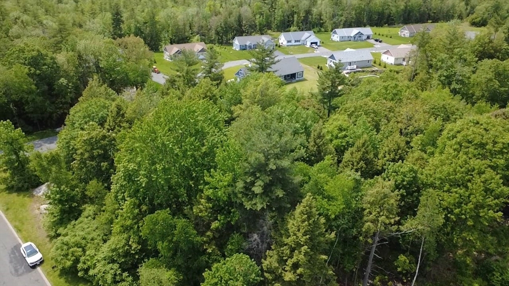 0 Miles Road Athol, MA 01331 - Photo 4 of 5 a backyard of a house with a yard and fountain