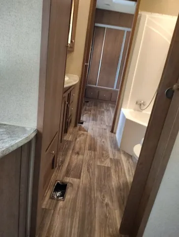 a view of entryway with wooden floor