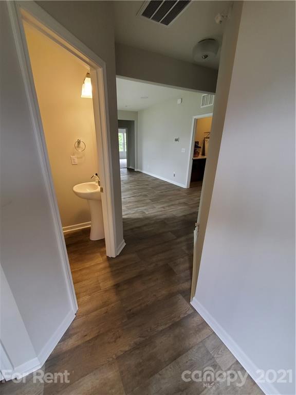 8633 River Ridge Drive Charlotte, NC 28213 - Photo 2 of 23 a view of a hallway view with wooden floor and entryway