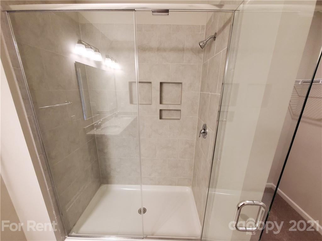 8633 River Ridge Drive Charlotte, NC 28213 - Photo 14 of 23 a bathroom with a shower