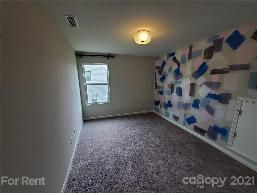 8633 River Ridge Drive Charlotte, NC 28213 - Photo 20 of 23 a view of an empty room with a window