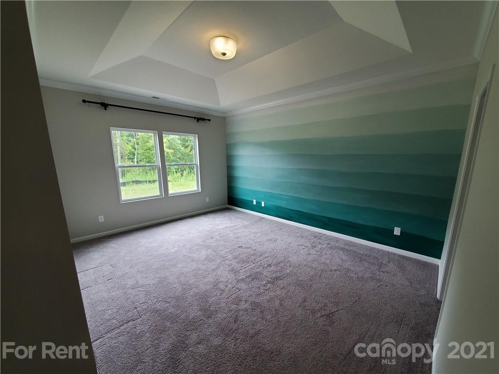 8633 River Ridge Drive Charlotte, NC 28213 - Photo 9 of 23 a view of an empty room with a window