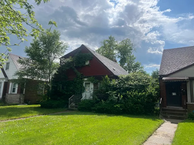 a house view with a garden space