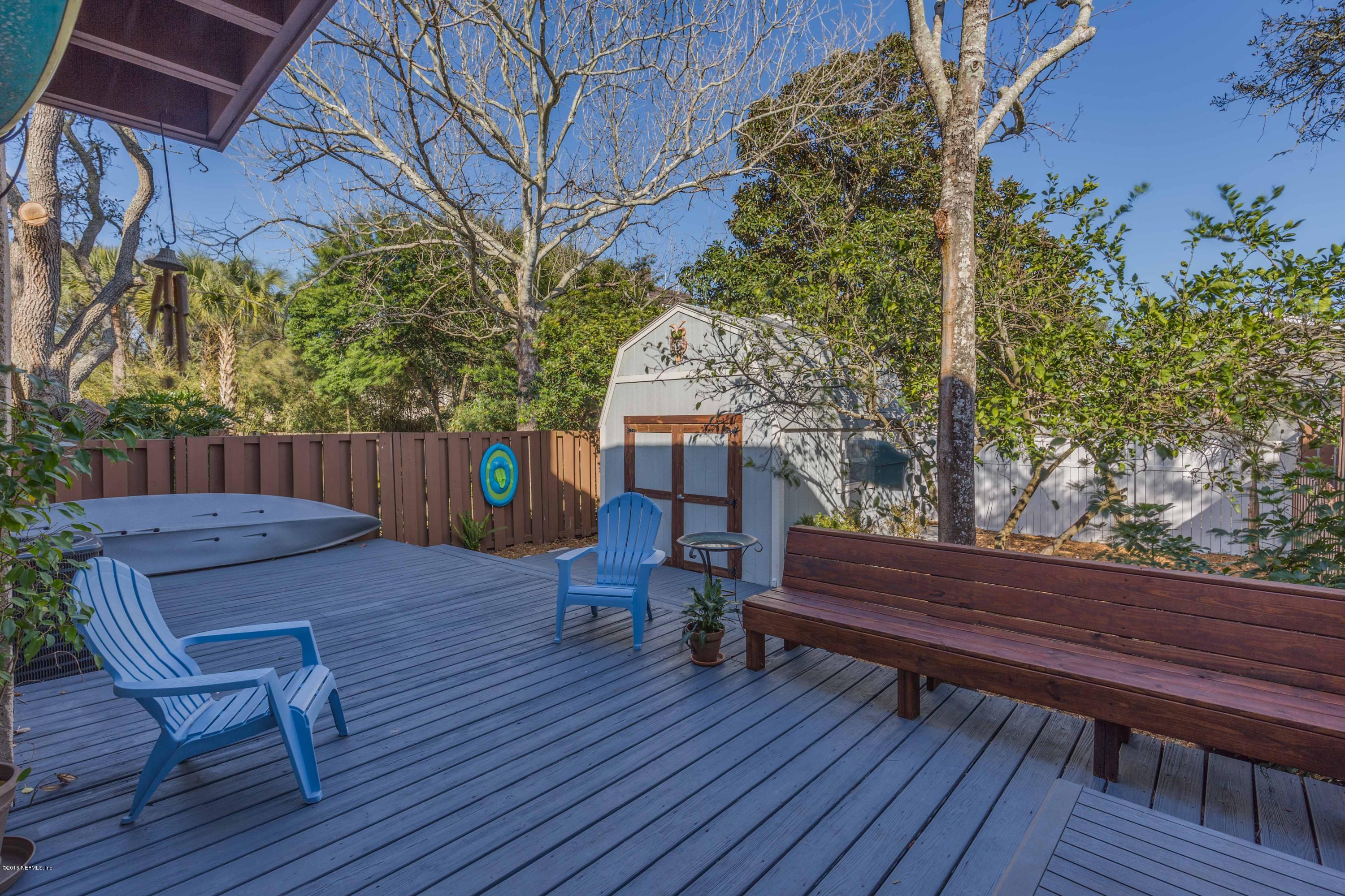 1755 Seminole Road Atlantic Beach, FL 32233 - Photo 22 of 28 a wooden bench sitting in front of a building