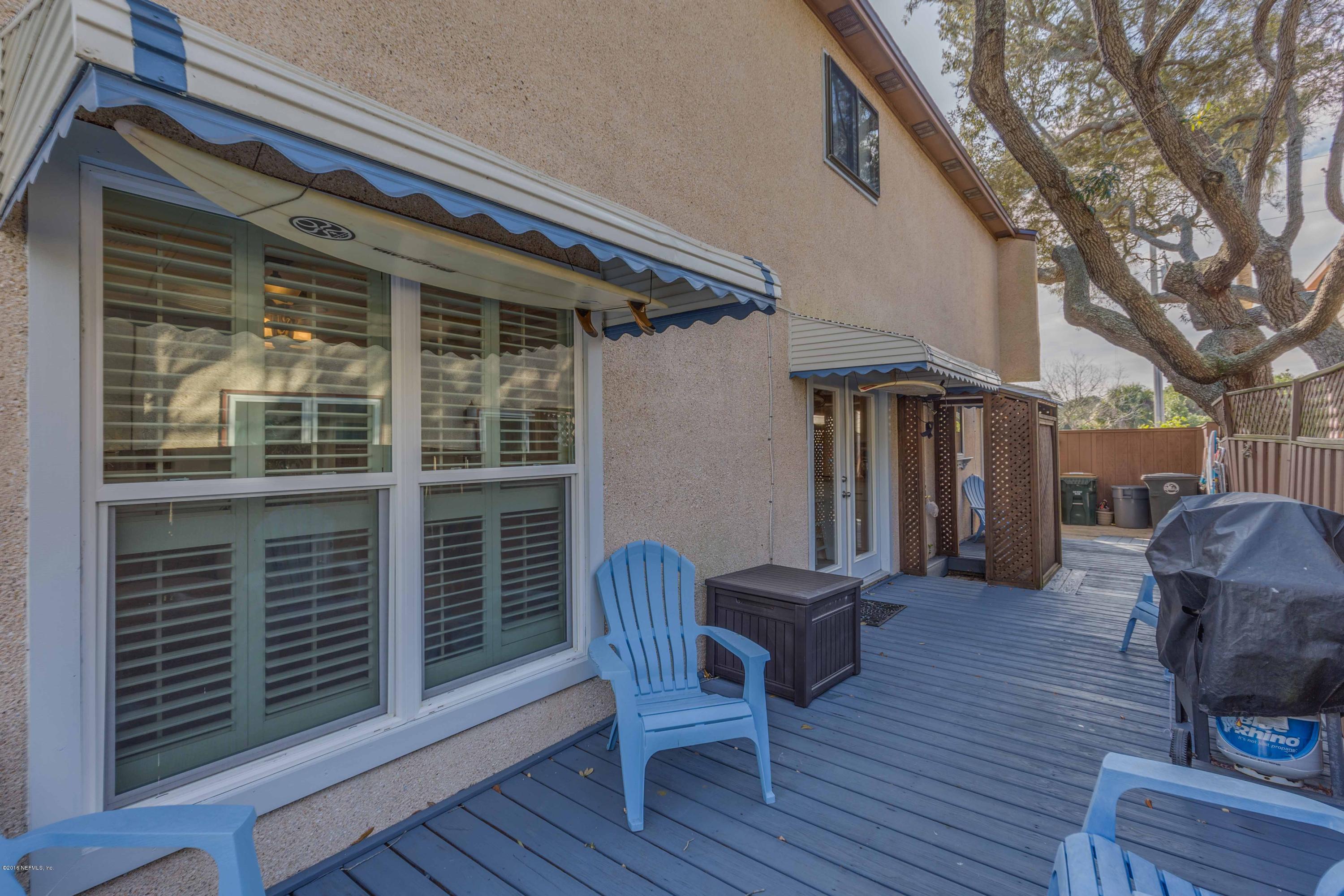 1755 Seminole Road Atlantic Beach, FL 32233 - Photo 26 of 28 a view of a chair and tables in the patio