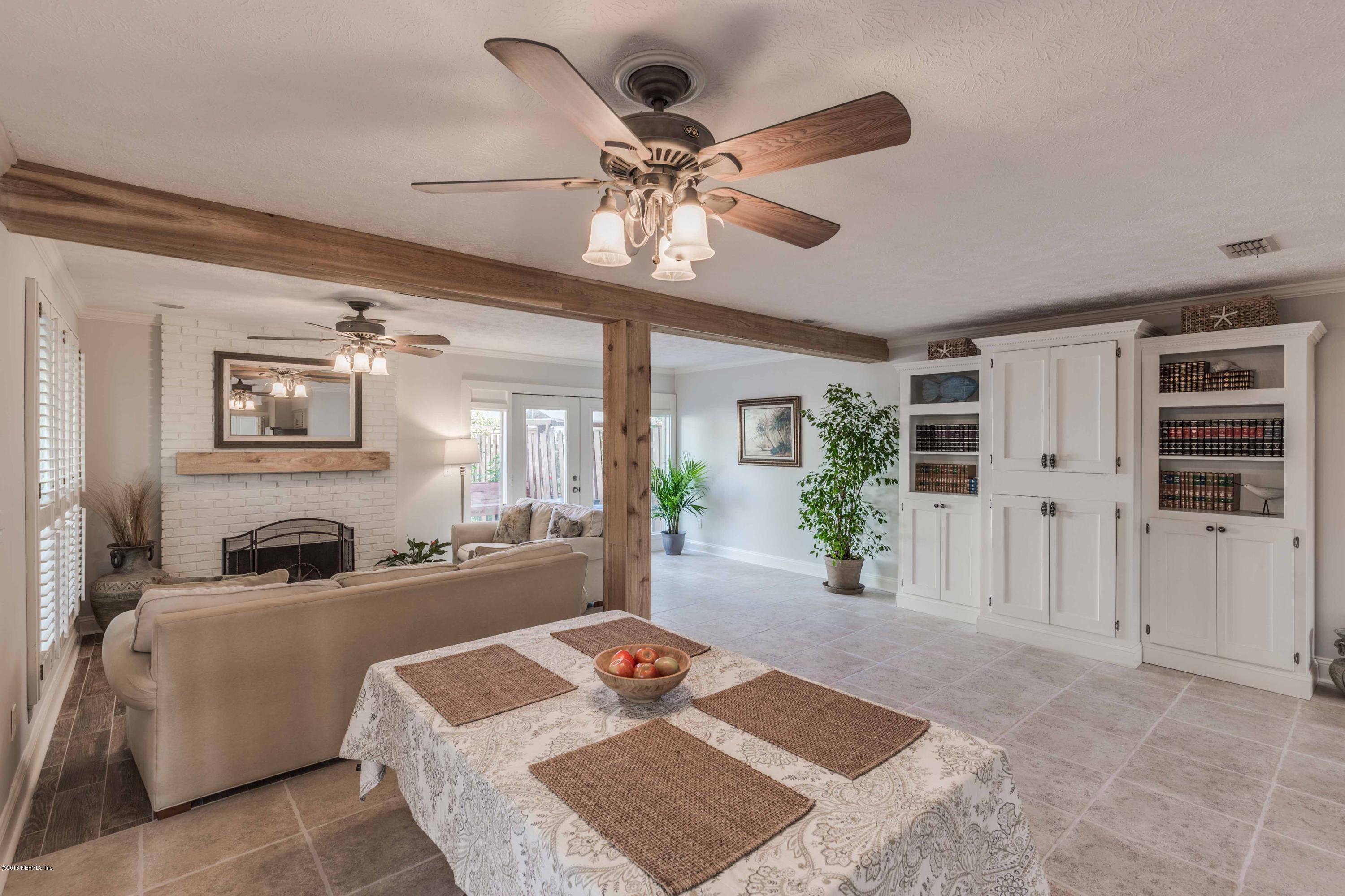 1755 Seminole Road Atlantic Beach, FL 32233 - Photo 8 of 28 a bedroom with furniture and window