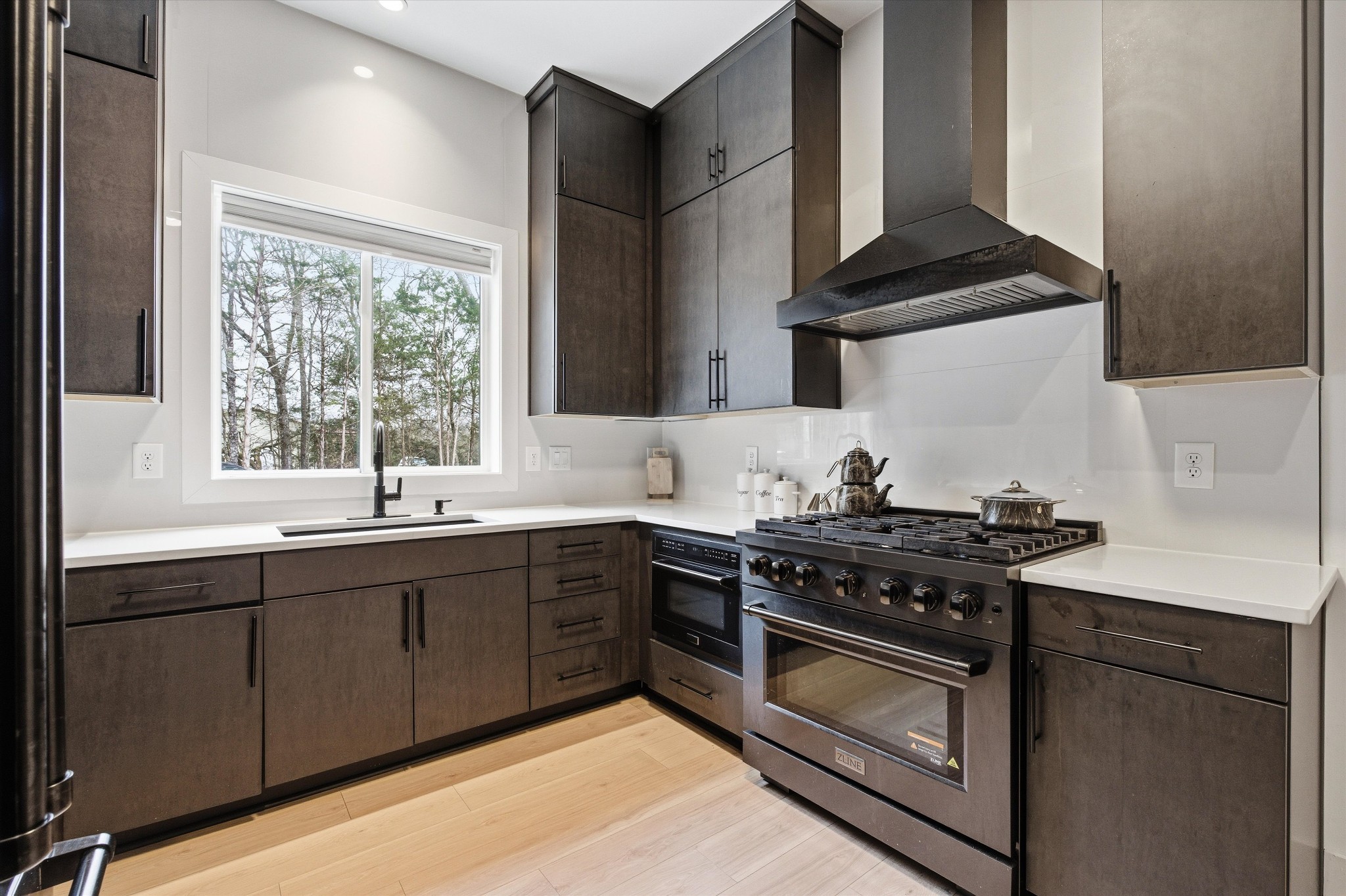 2085 Kidd Road Nolensville, TN 37135 - Photo 35 of 88 a kitchen with stainless steel appliances a stove and a sink