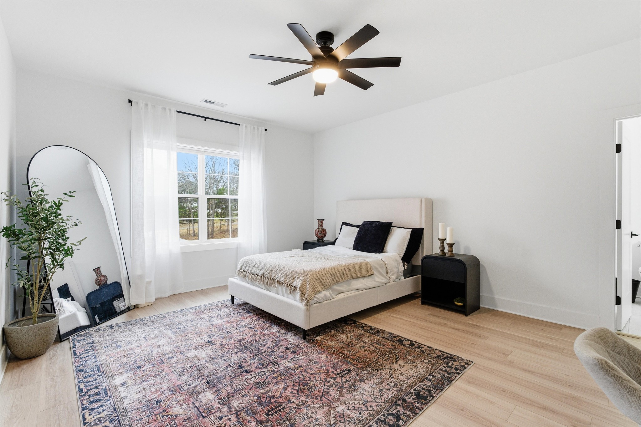 2085 Kidd Road Nolensville, TN 37135 - Photo 37 of 88 a bedroom with bed and a potted plant