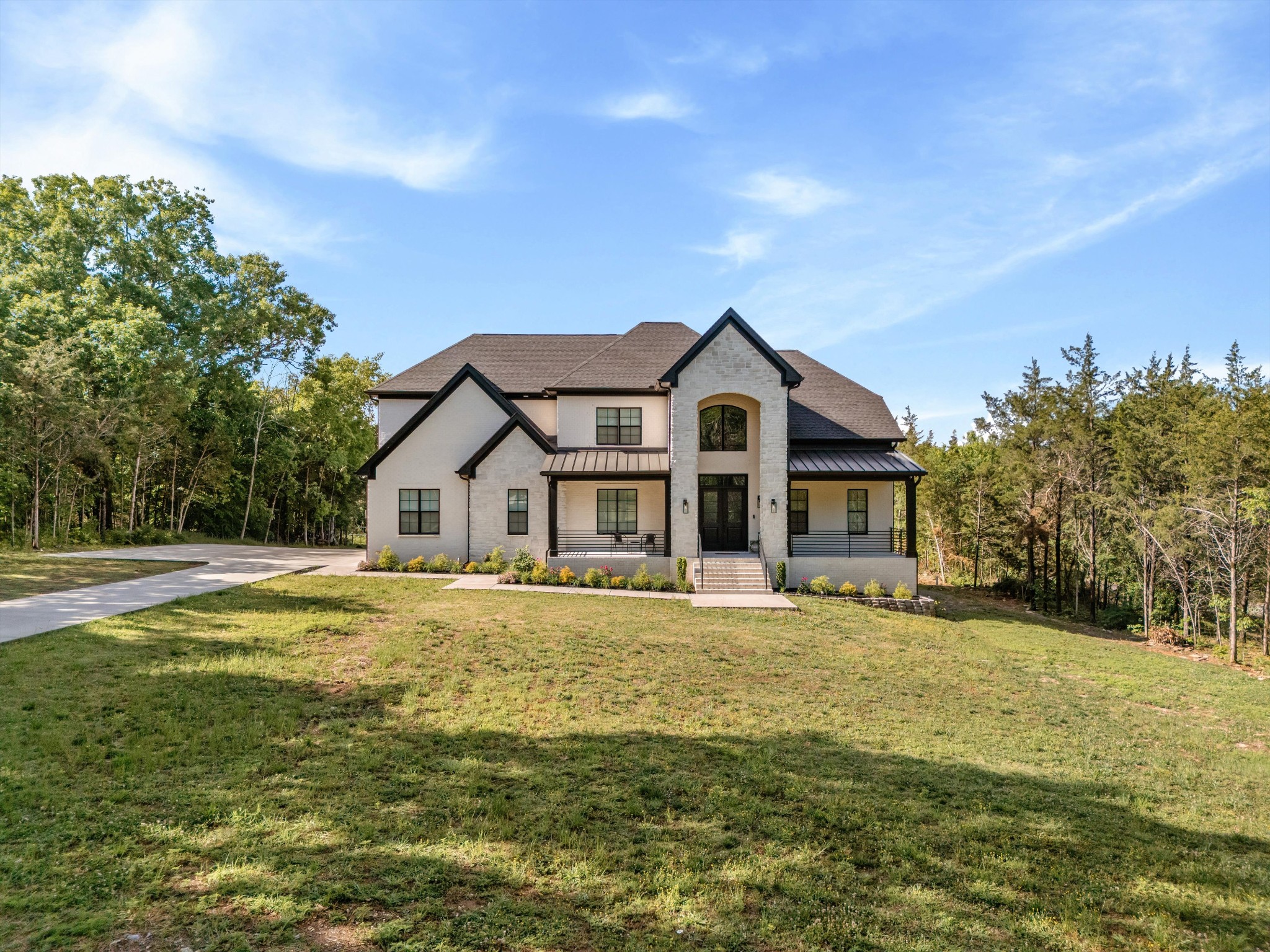 2085 Kidd Road Nolensville, TN 37135 - Photo 4 of 88 a front view of a house with a yard