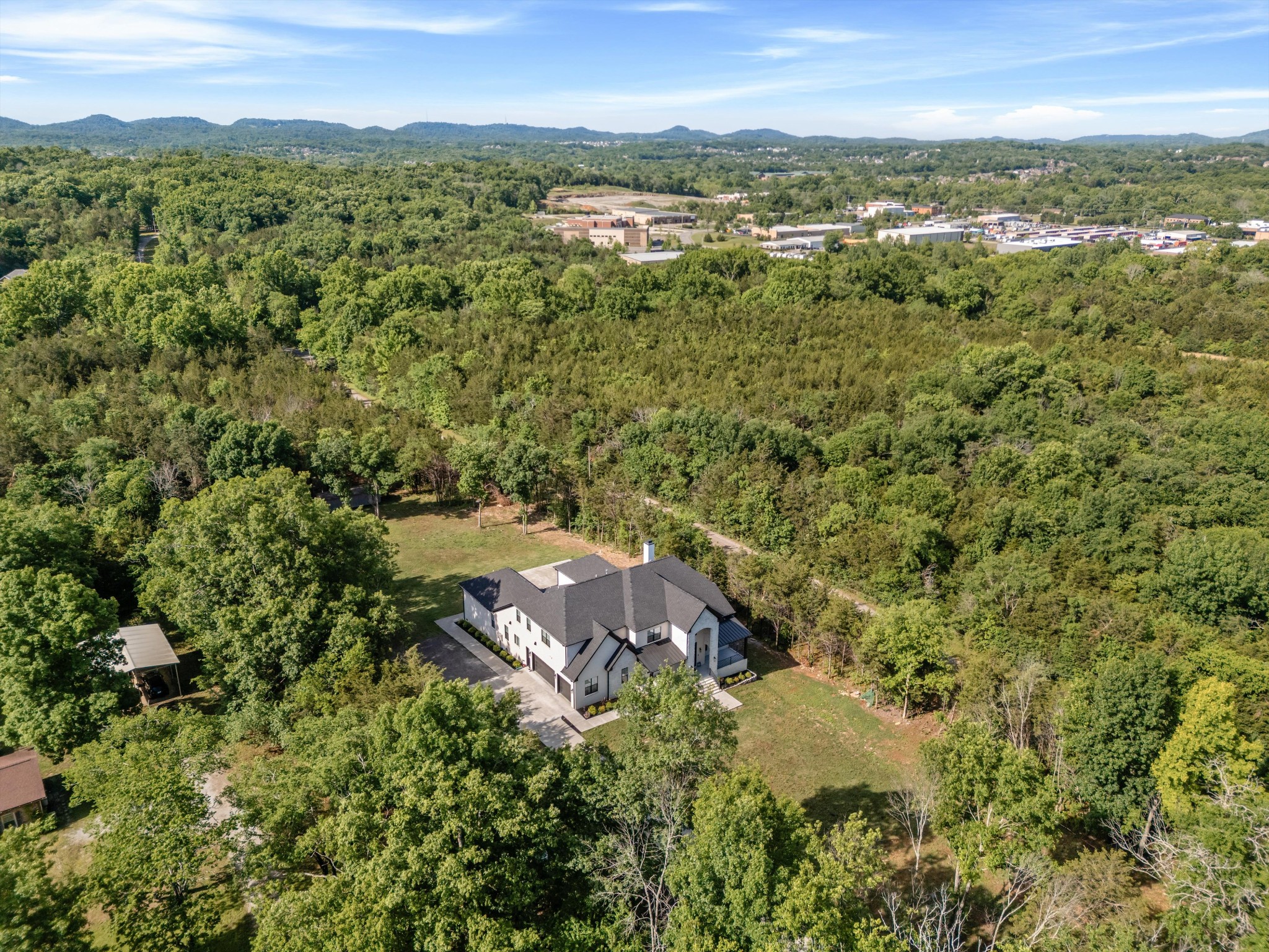 2085 Kidd Road Nolensville, TN 37135 - Photo 84 of 88 an aerial view of residential house with outdoor space and trees all around