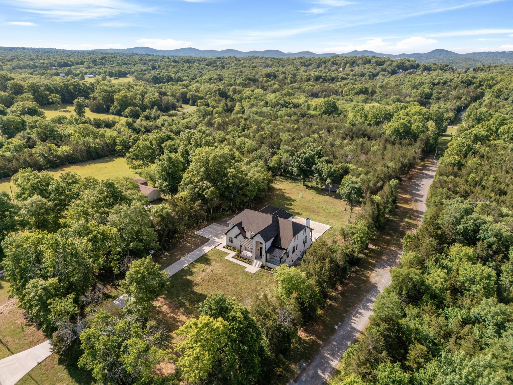 2085 Kidd Road Nolensville, TN 37135 - Photo 86 of 88 an aerial view of a house with a yard