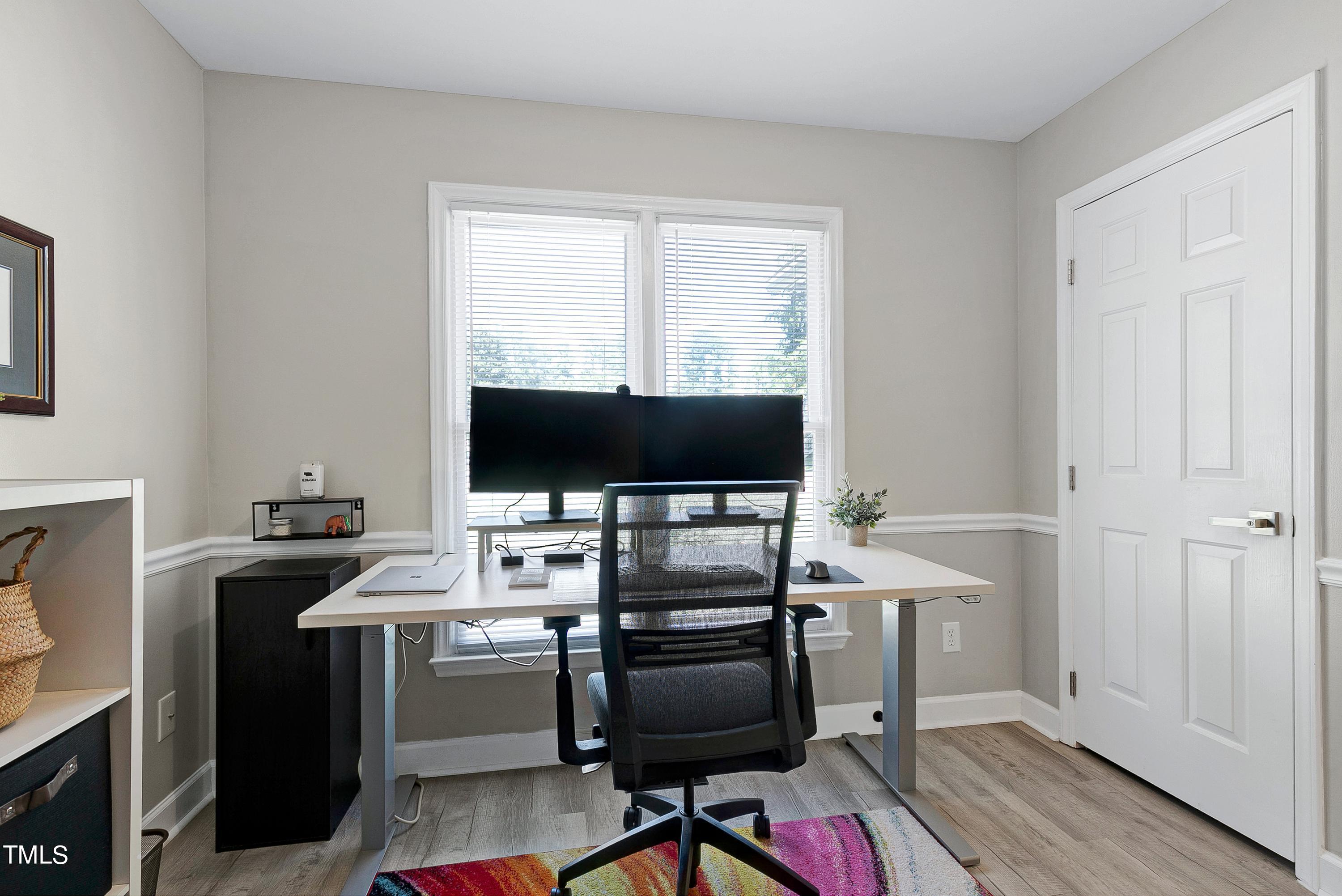 4700 Jacqueline Lane Raleigh, NC 27616 - Photo 31 of 40 a view of a workspace with furniture and a window