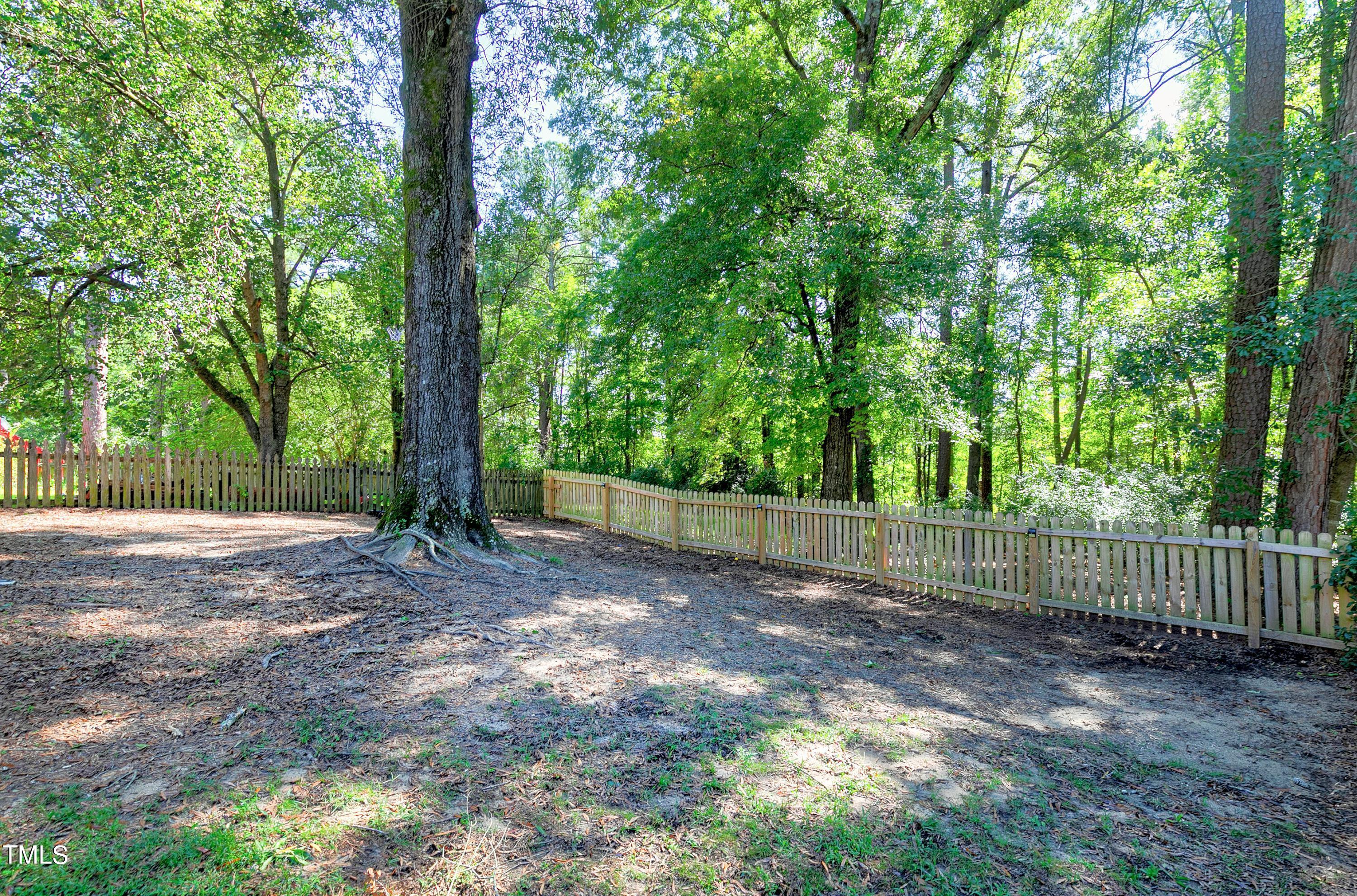 4700 Jacqueline Lane Raleigh, NC 27616 - Photo 39 of 40 a view of a yard with large trees