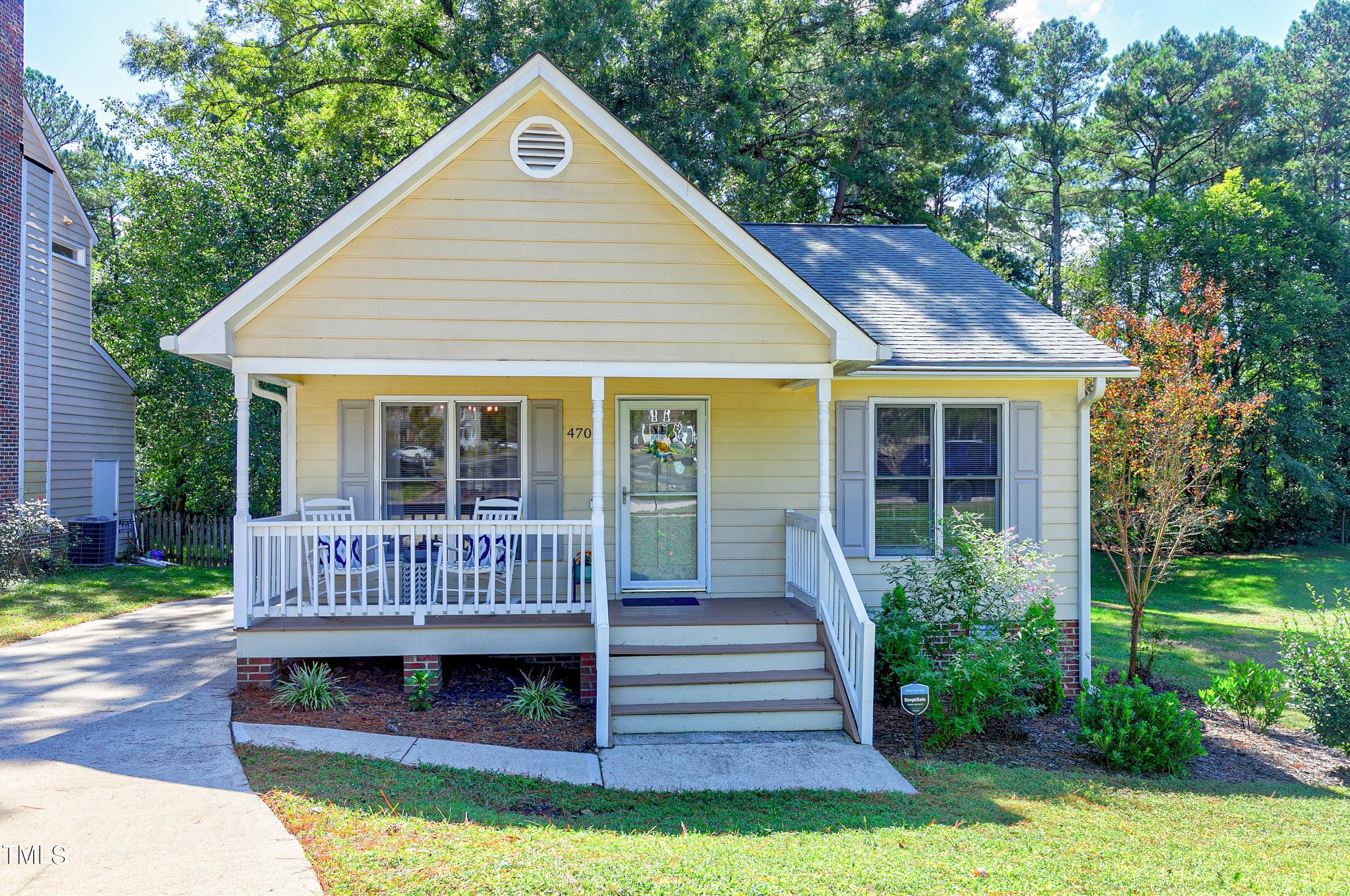 4700 Jacqueline Lane Raleigh, NC 27616 - Photo 40 of 40 a view of a house with a yard deck and a garden