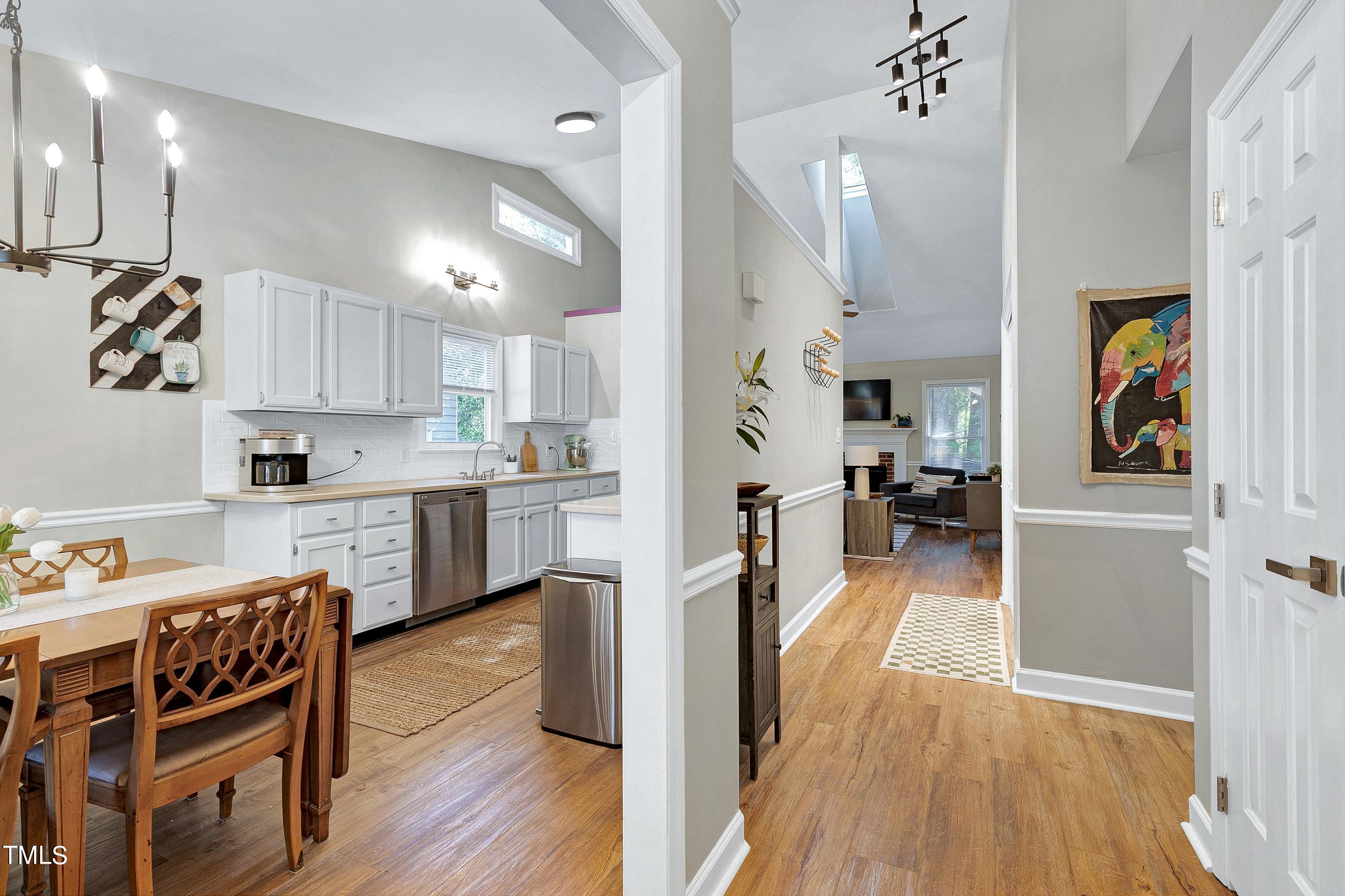 4700 Jacqueline Lane Raleigh, NC 27616 - Photo 5 of 40 a view of a kitchen and dining room