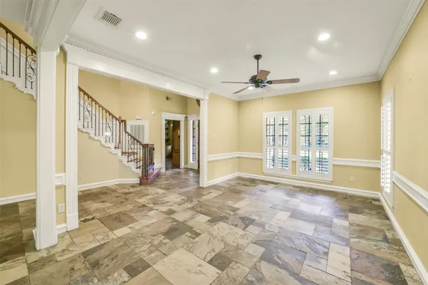a view of an entryway with wooden floor