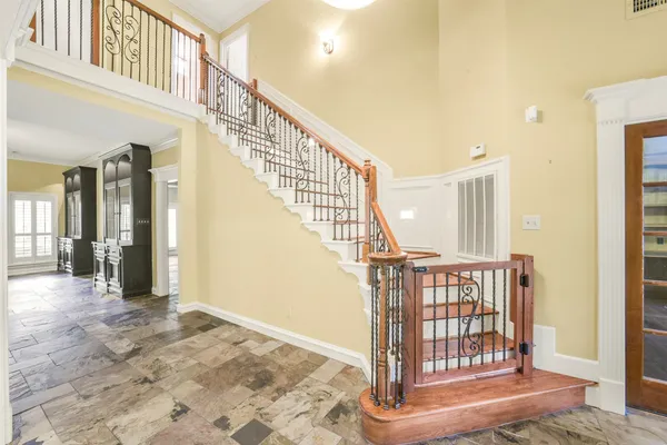 a view of an entryway with staircase
