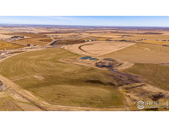 a bathroom with a sink and a floor to ceiling window
