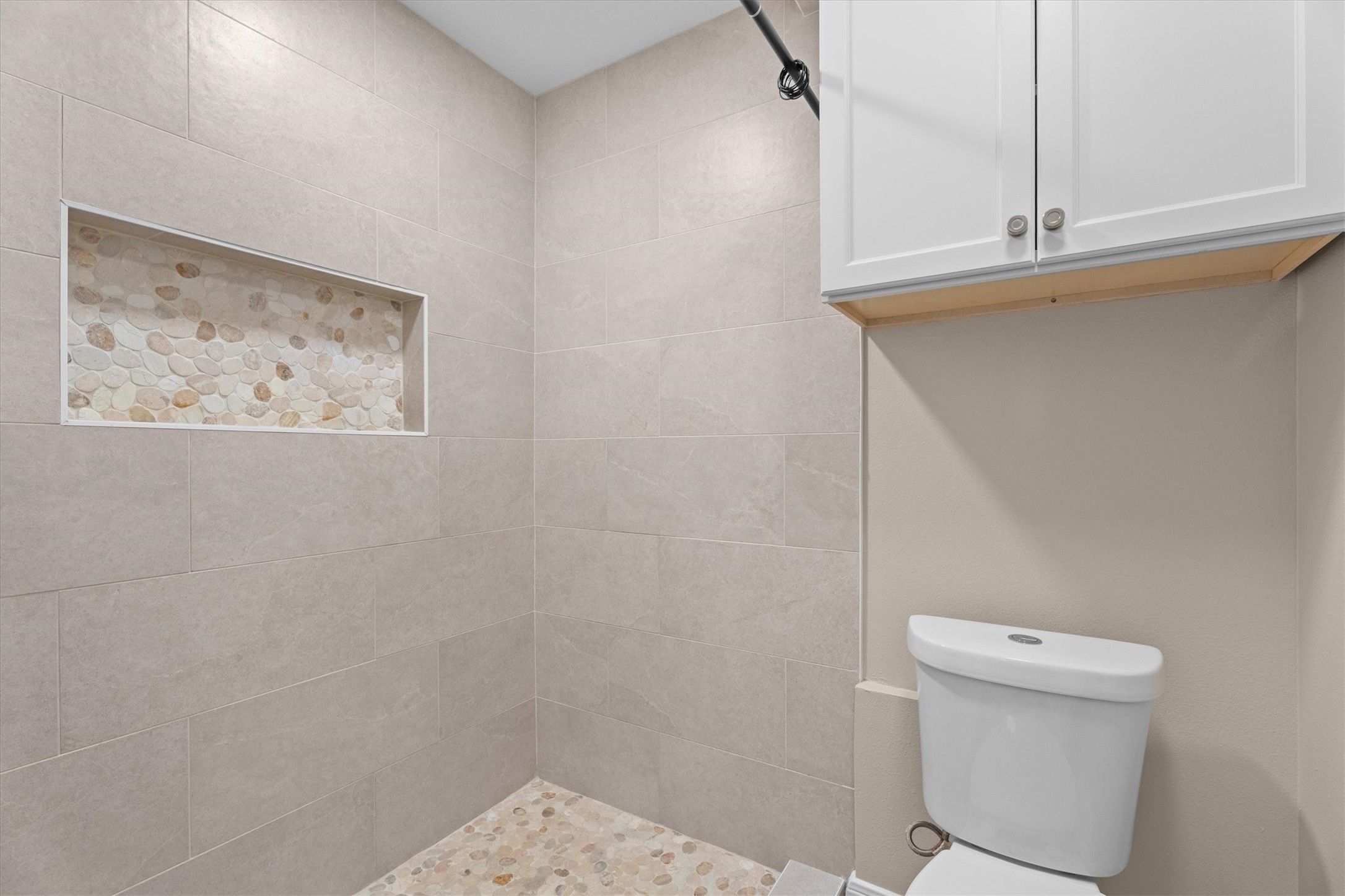 6530 Bayonne Drive Spring, TX 77389 - Photo 31 of 37 a bathroom with a toilet and a shower