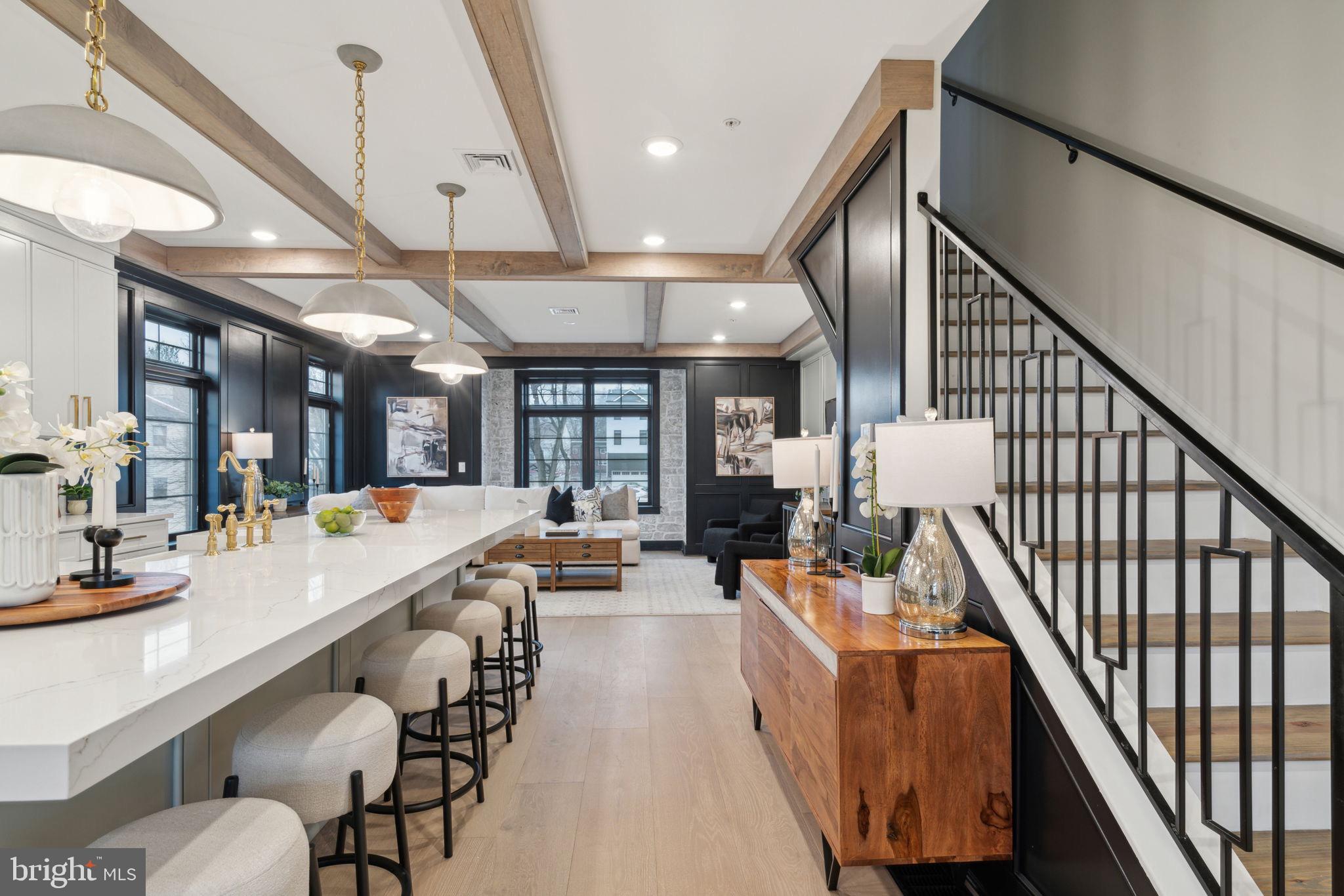 7519 Ridge Avenue, Unit 304 Philadelphia, PA 19128 - Photo 37 of 38 a lobby with furniture and staircase