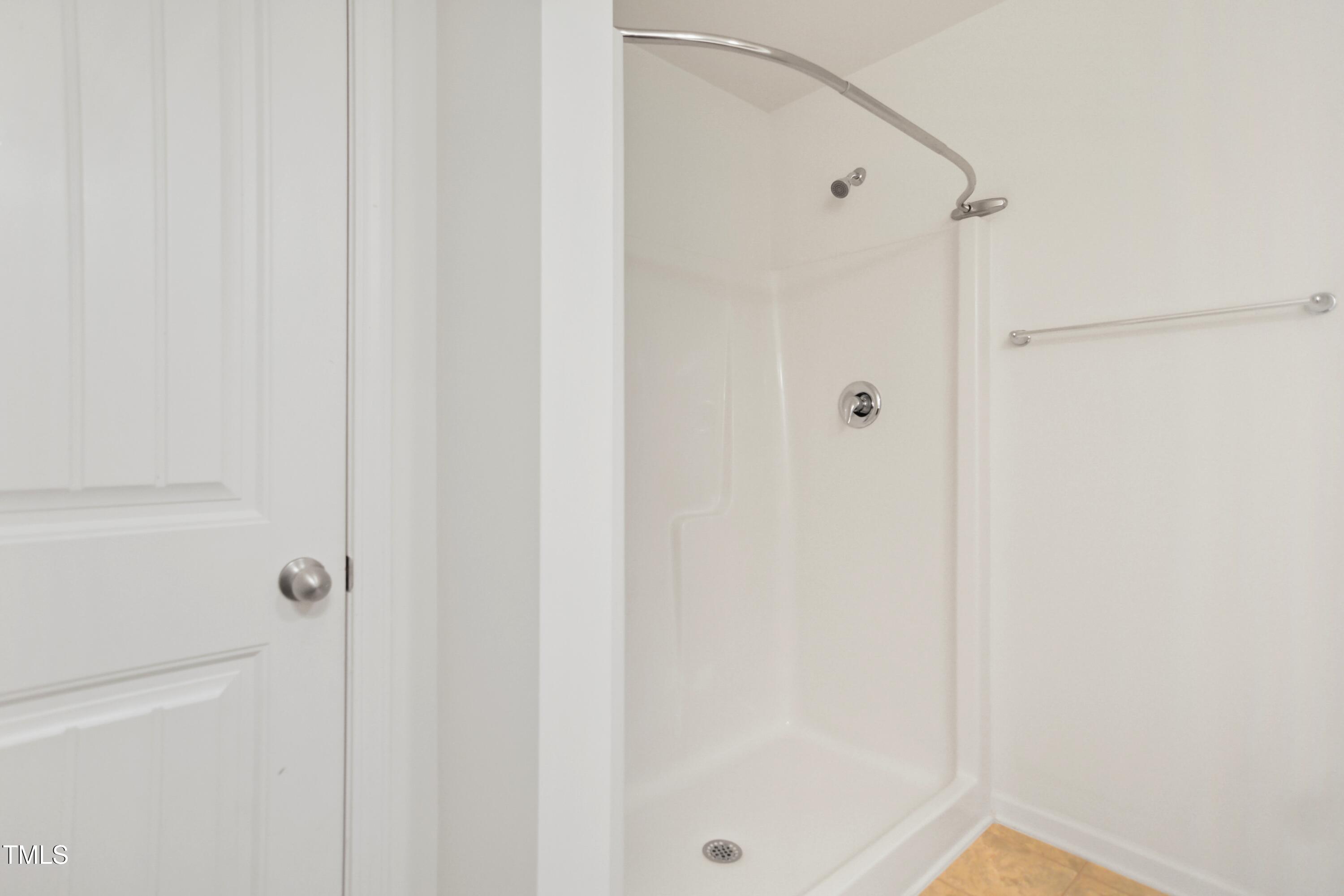 2901 Benevolence Drive Raleigh, NC 27610 - Photo 13 of 18 a bathroom with a shower