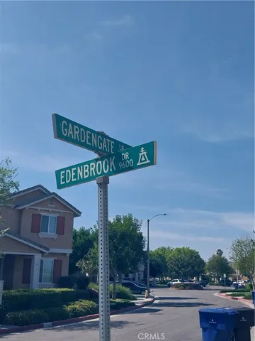 a street sign on a pole on a street