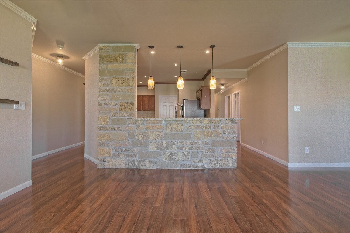 3112 Clinton Place Round Rock, TX 78665 - Photo 11 of 36 a view of a hallway with wooden floor