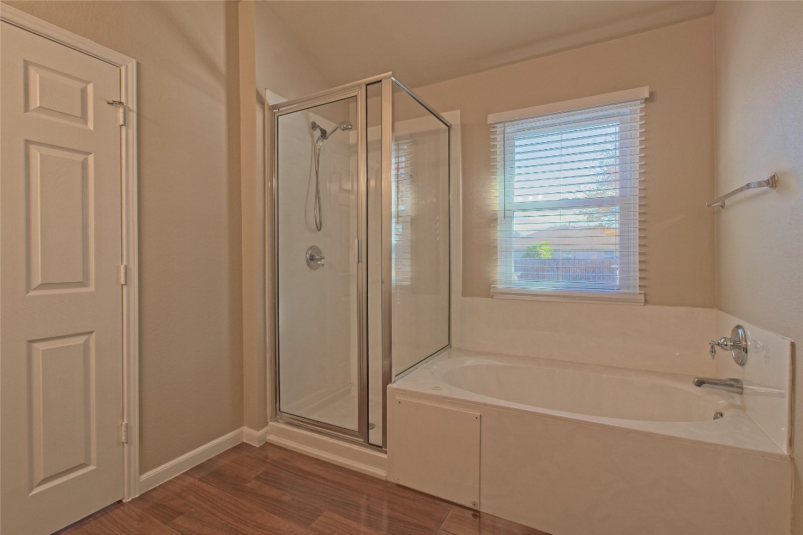 3112 Clinton Place Round Rock, TX 78665 - Photo 24 of 36 a white bath tub sitting next to a window