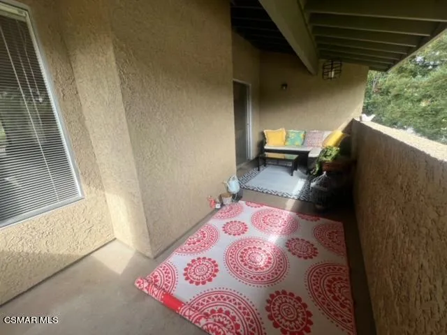 a view of a garden with potted plants