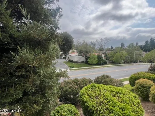 a view of swimming pool from a window