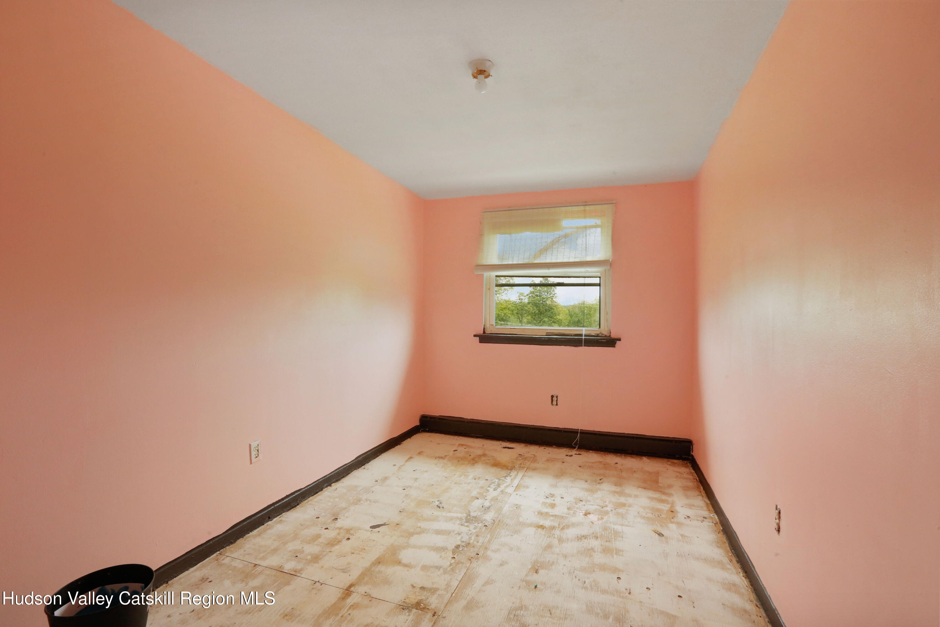 881 Albany Post Road, Unit 5 New Paltz, NY 12561 - Photo 14 of 16 an empty room with a window