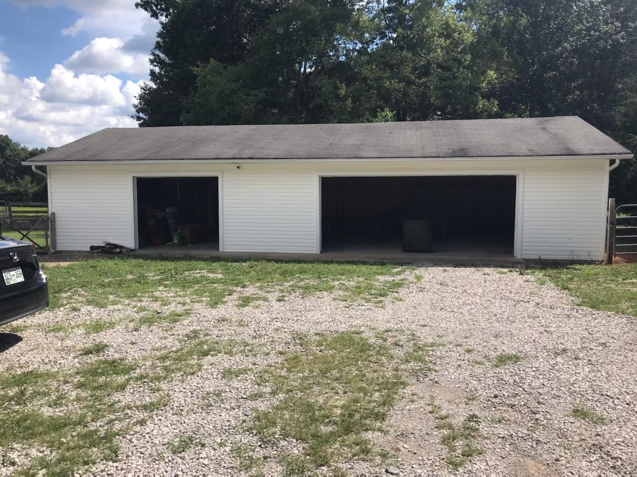 4576 Kedron Road Spring Hill, TN 37174 - Photo 31 of 35 a front view of a house with garage