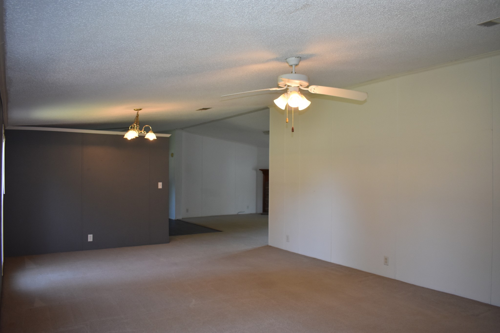 4576 Kedron Road Spring Hill, TN 37174 - Photo 10 of 35 wooden floor in an empty room with a chandelier fan
