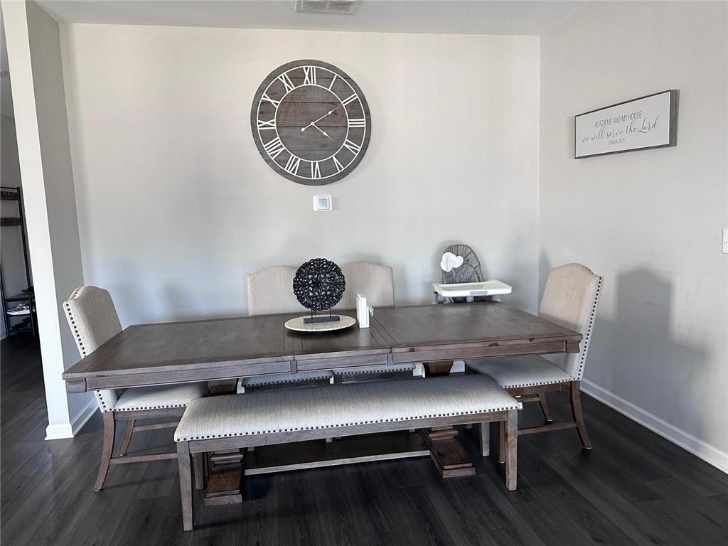 53 Seed Lane Pendergrass, GA 30567 - Photo 7 of 22 a view of a workspace with furniture and wooden floor