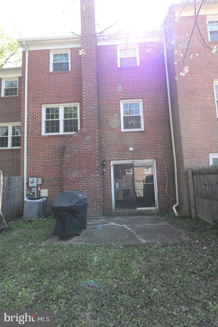 9120 Conservation Way Springfield, VA 22153 - Photo 2 of 19 a view of house with backyard space and garden