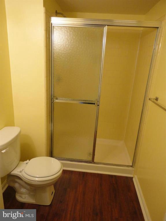 9120 Conservation Way Springfield, VA 22153 - Photo 10 of 19 a bathroom with a toilet and a shower