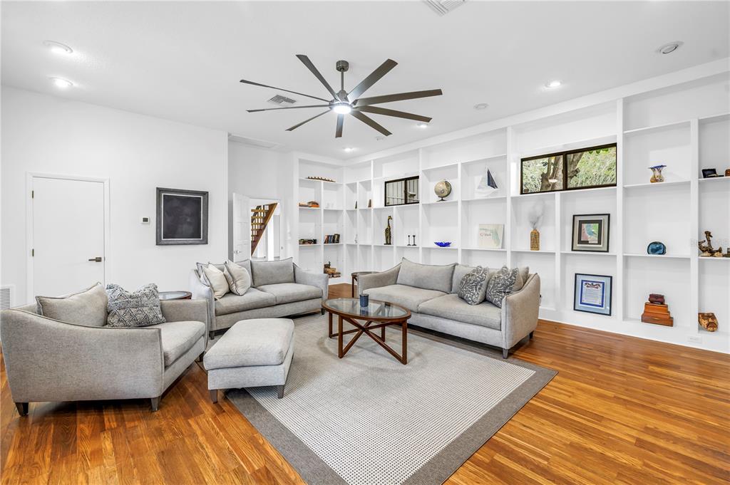 4605 Stone Ridge Trail Sarasota, FL 34232 - Photo 21 of 56 a living room with furniture and a wooden floor