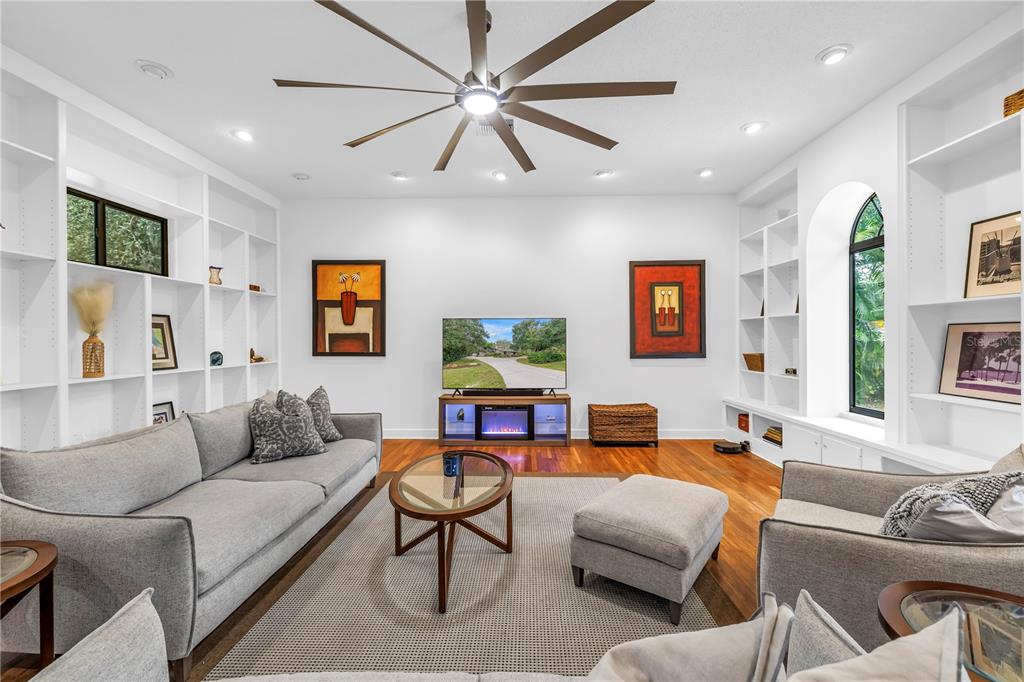 4605 Stone Ridge Trail Sarasota, FL 34232 - Photo 22 of 56 a living room with furniture and a flat screen tv