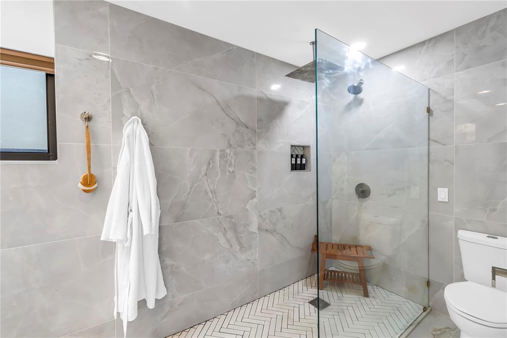 4605 Stone Ridge Trail Sarasota, FL 34232 - Photo 31 of 56 a bathroom with a sink a toilet and shower