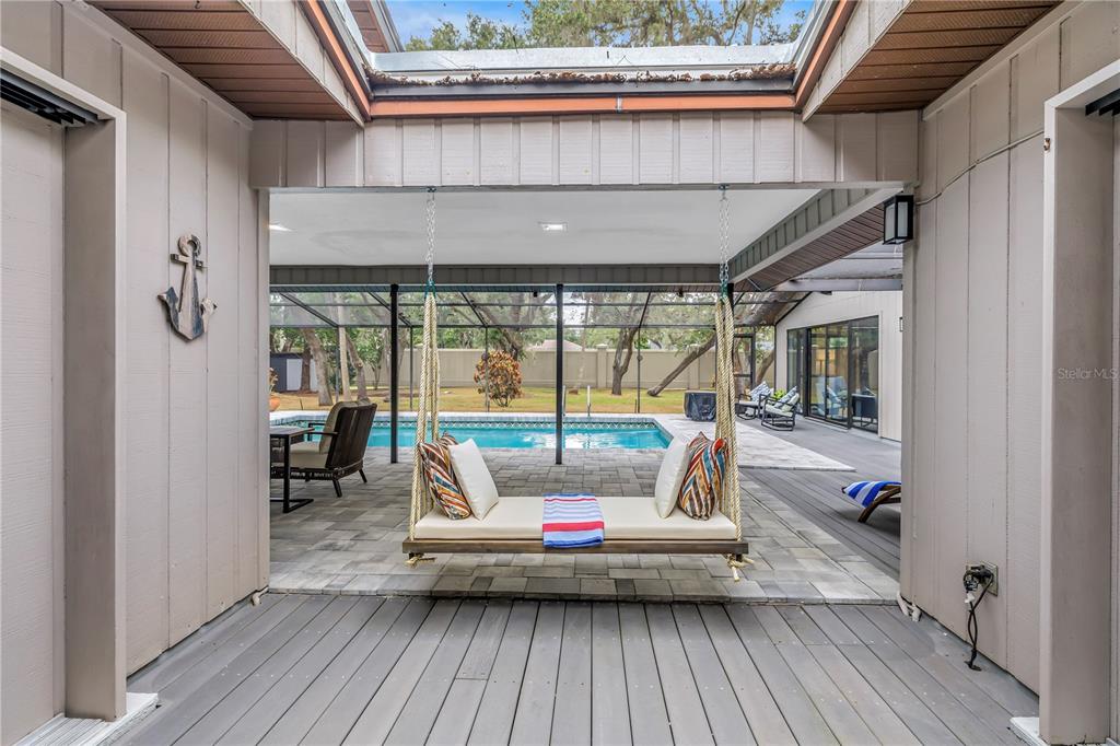 4605 Stone Ridge Trail Sarasota, FL 34232 - Photo 40 of 56 a outdoor view with a sitting space and large trees