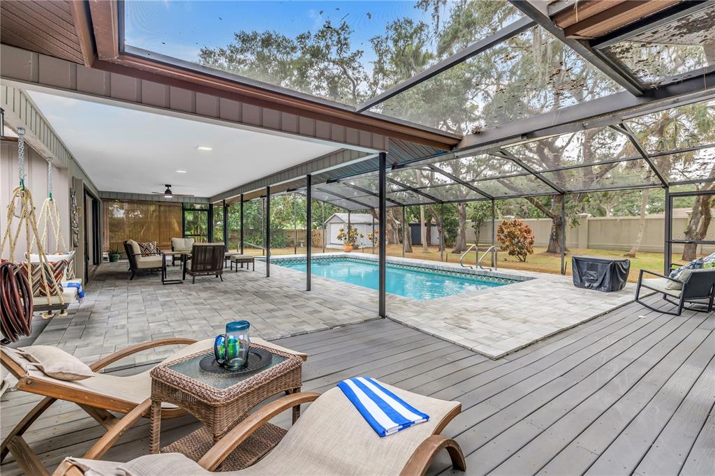 4605 Stone Ridge Trail Sarasota, FL 34232 - Photo 4 of 56 a outdoor space with lots of furniture